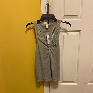 Quarter v-up, button-up ribbed Calvin Klein pajama tank top; “CK” logo print